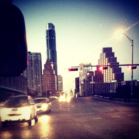 Driving north on Congress Bridge in Austin, circa 2013. There are barely any buildings on the skyline compared to today.