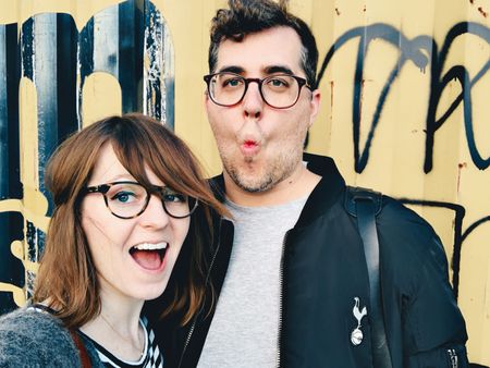 Joel Goodman standing with his wife in Austin