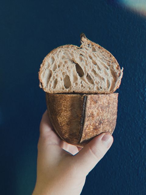 Crumb shot of a small loaf of sourdough bread with nice open crumb.